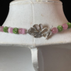 Pink Cat’s Eye with Green Pave